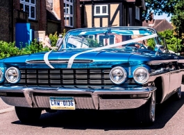 Blue Oldsmobile for wedding hire in Windsor